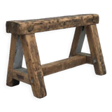 Trestle-shaped wooden bench
