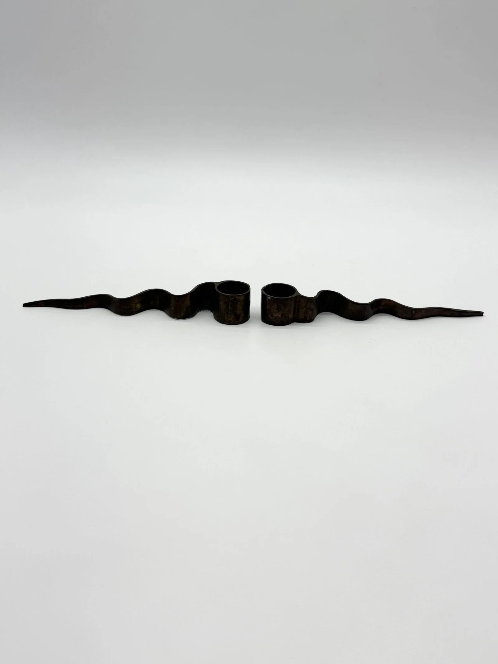 Pair of "Serpentine" candlesticks, modernist, 1970s