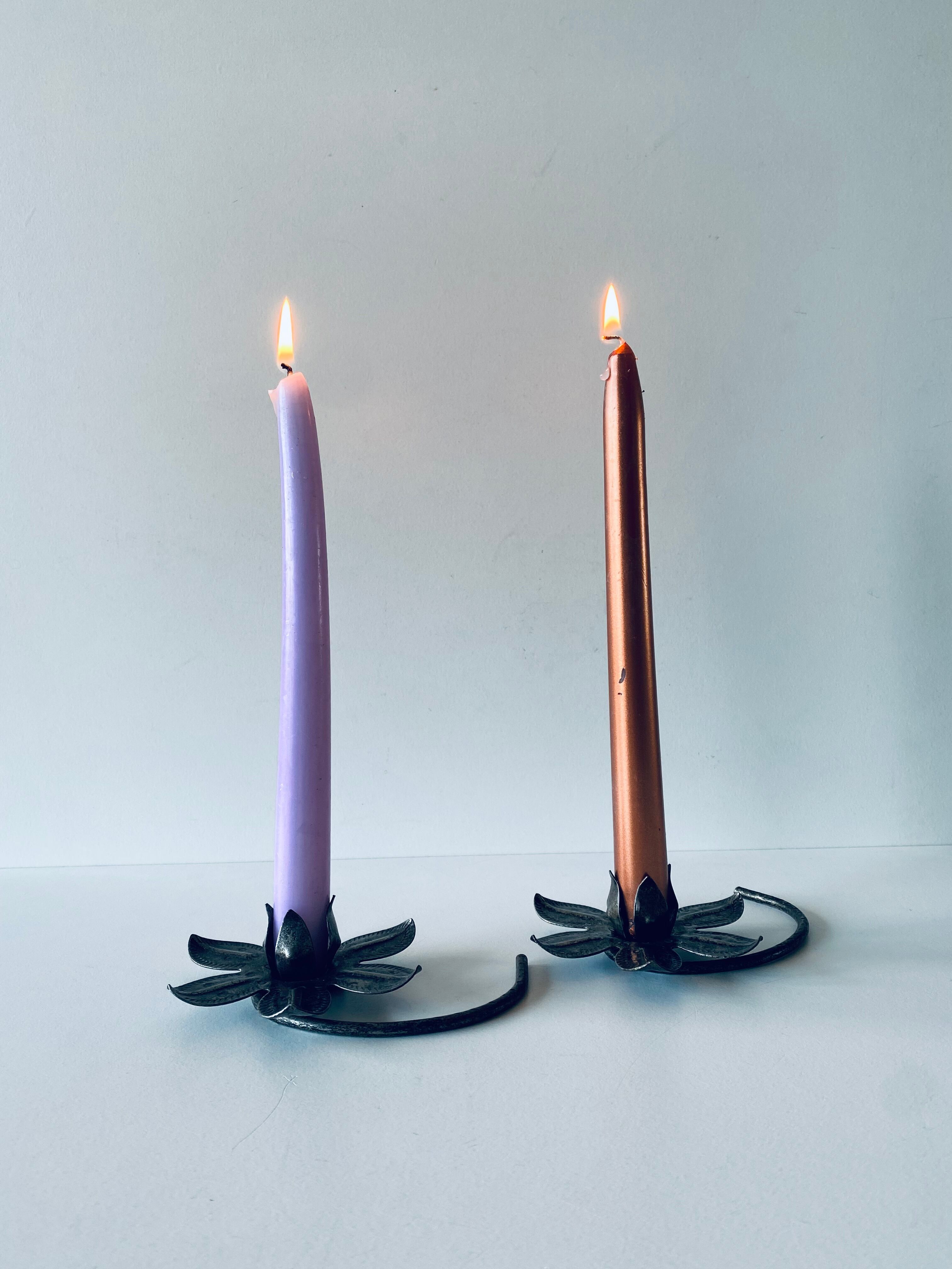 Pair of iron water lily candle holders