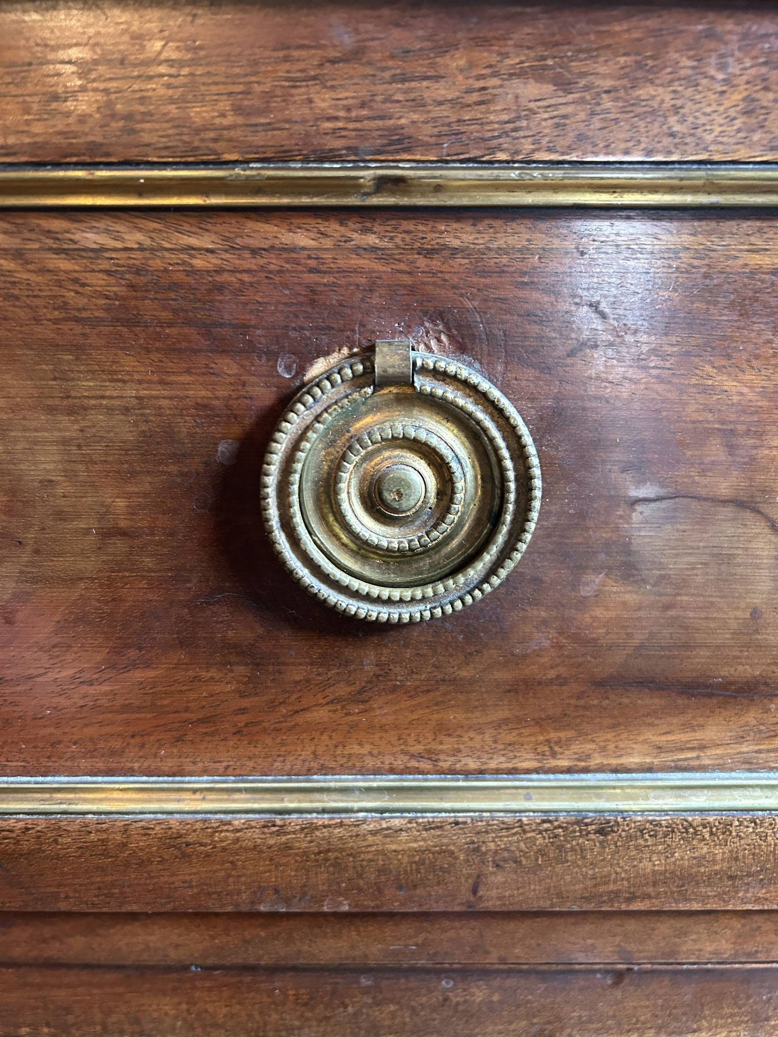 Mahogany and black marble chest of drawers, late 18th-early 19th century
