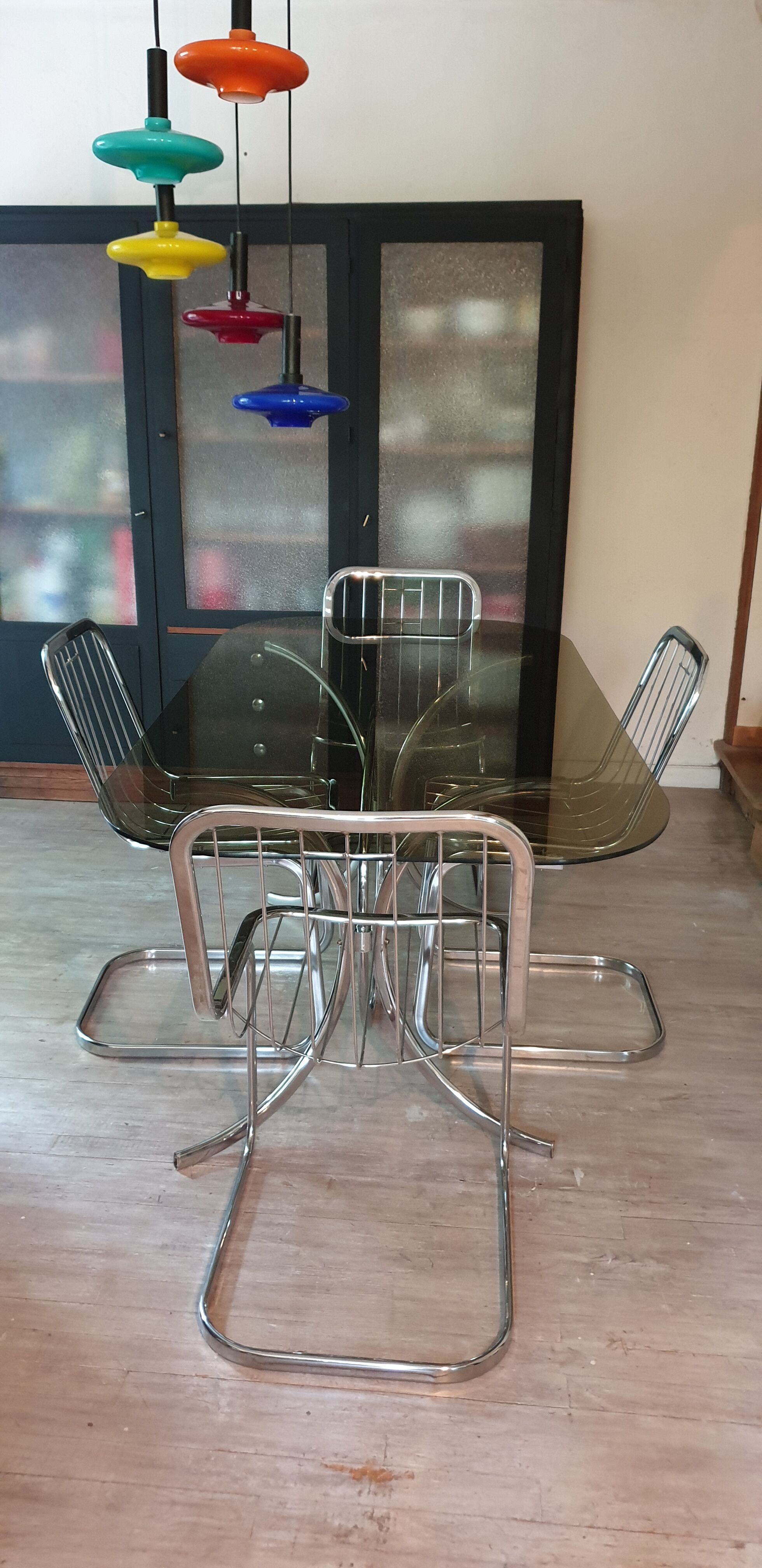 Table and four chrome chairs