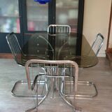 Table and four chrome chairs