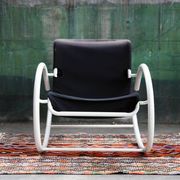 Rocking chair Memphis Ellipse leather Les Amisco with its cushion