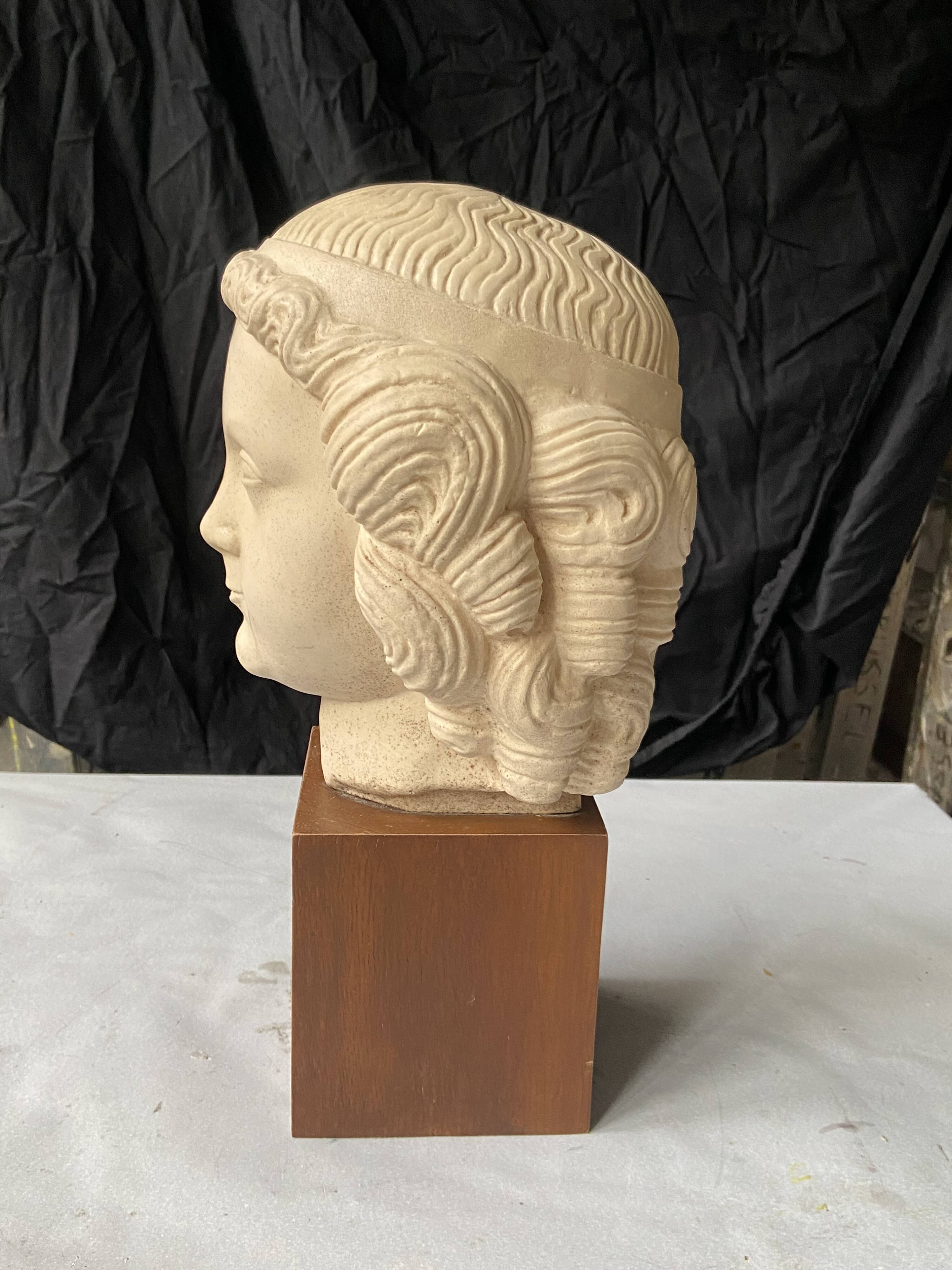 antique head sculpture Louvre Museum