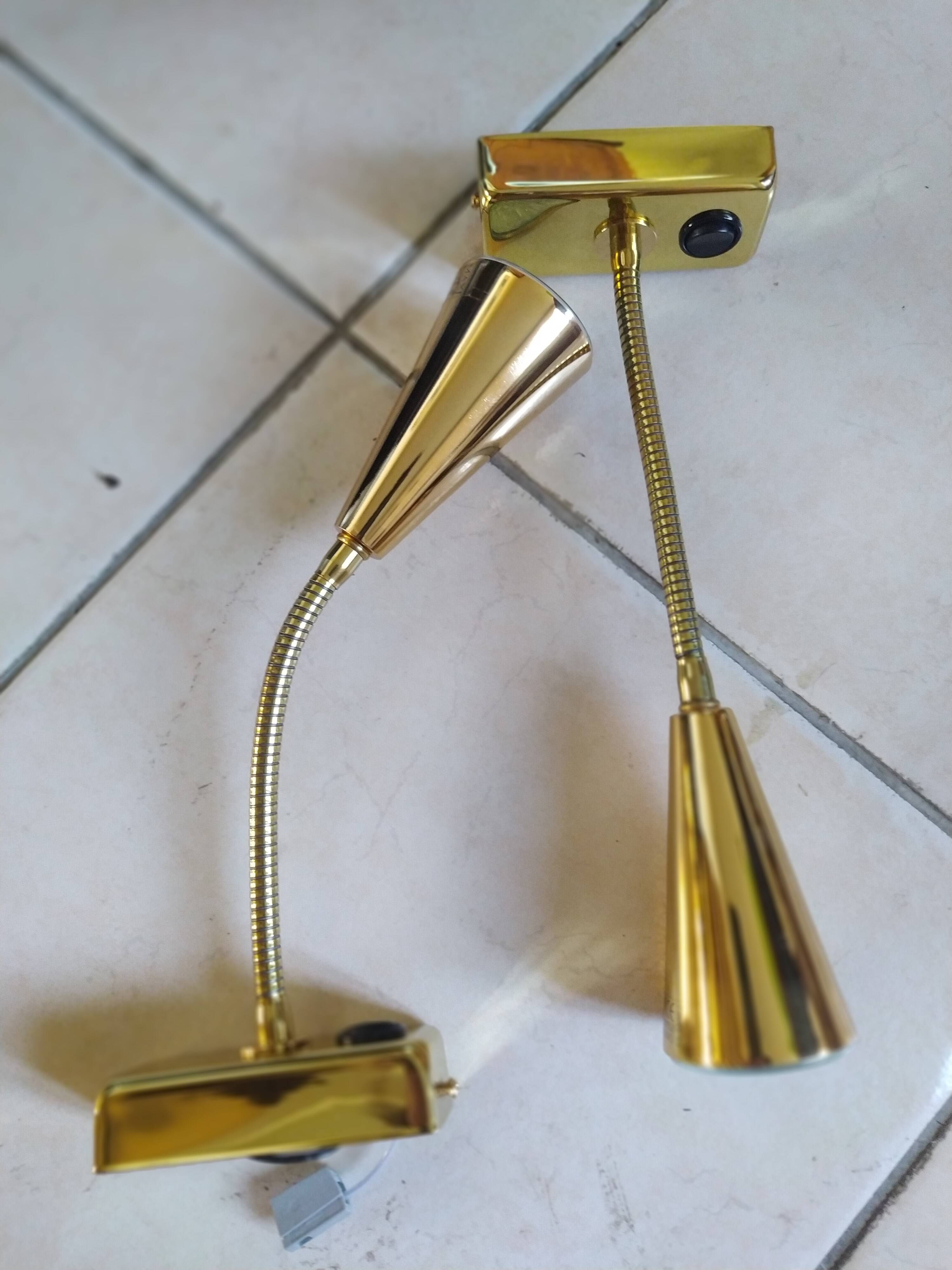 Pair of golden wall lights from the brossier saderne brand