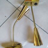 Pair of golden wall lights from the brossier saderne brand