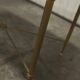 Marble coffee table with brass legs, height 46 cm.