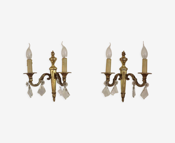 Pair of French empire brass double wall lights with diamond crystal drops