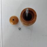 Turned wooden pepper mill