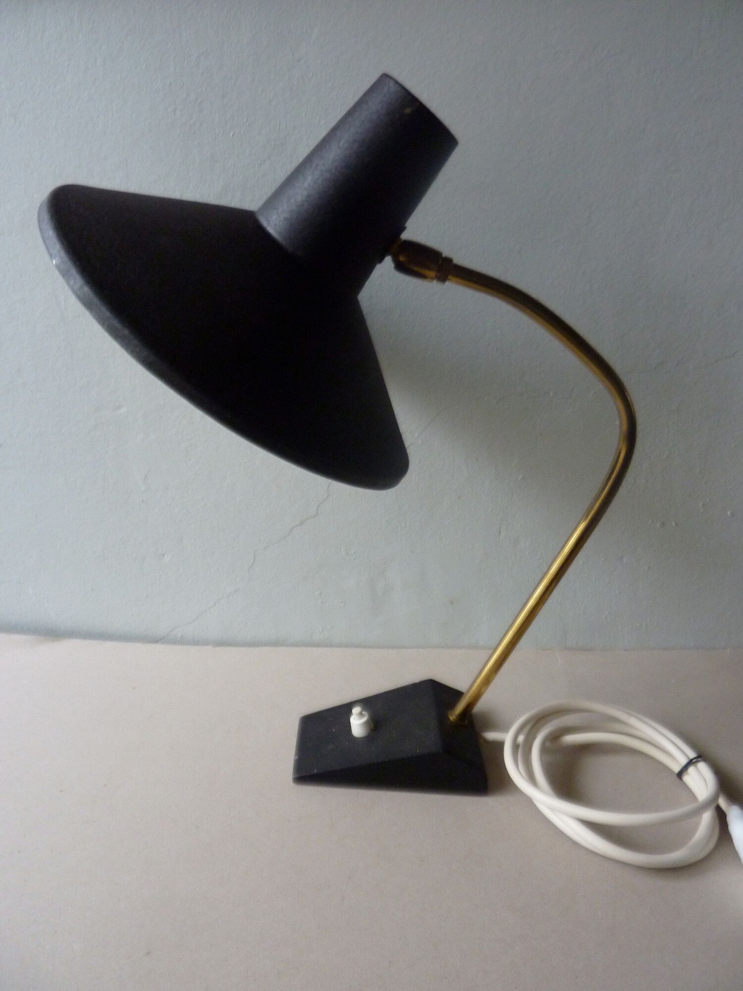 Lamp with ball black metal and brass of the 1950s