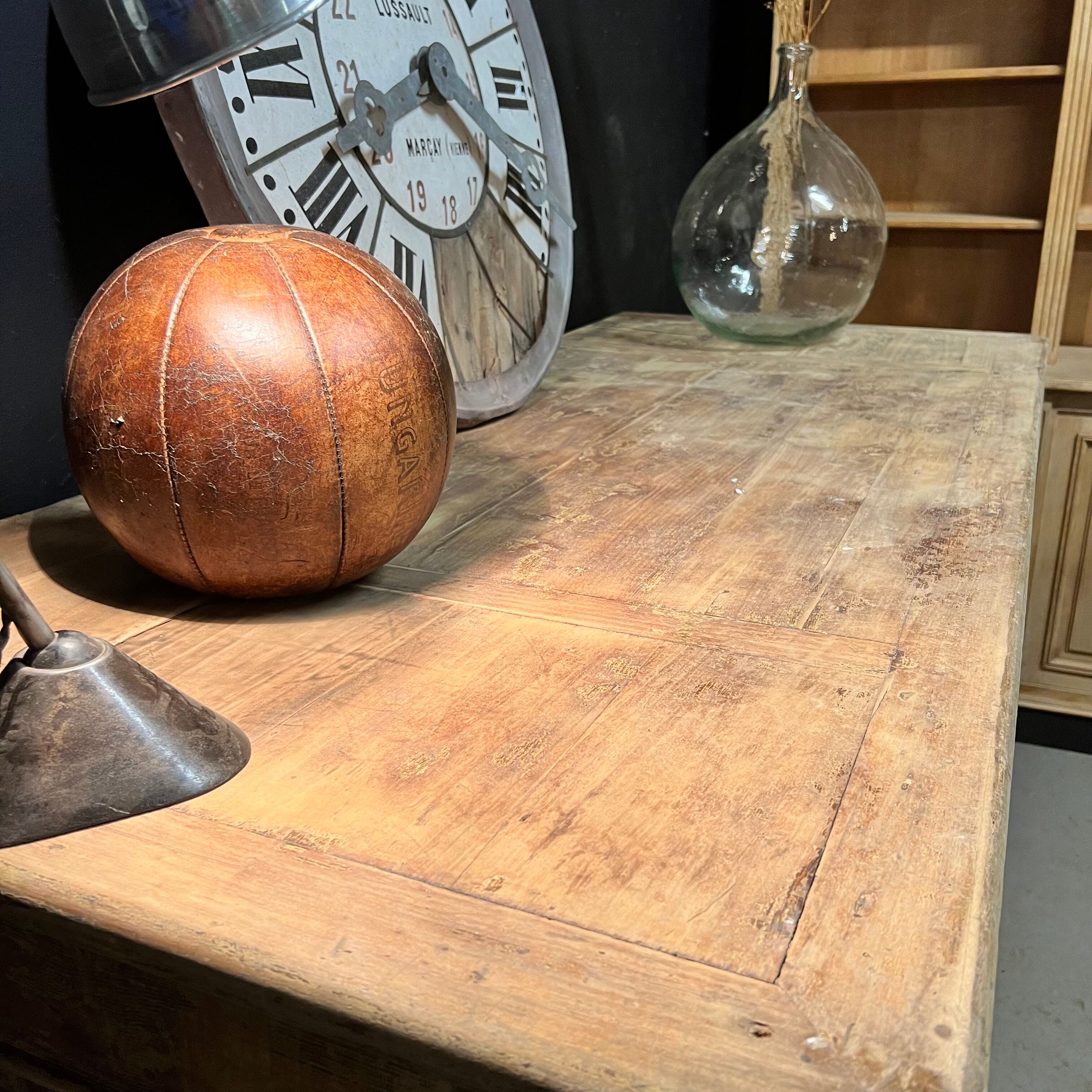 Old piece of furniture by trade with an architect's plan