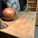 Old piece of furniture by trade with an architect's plan