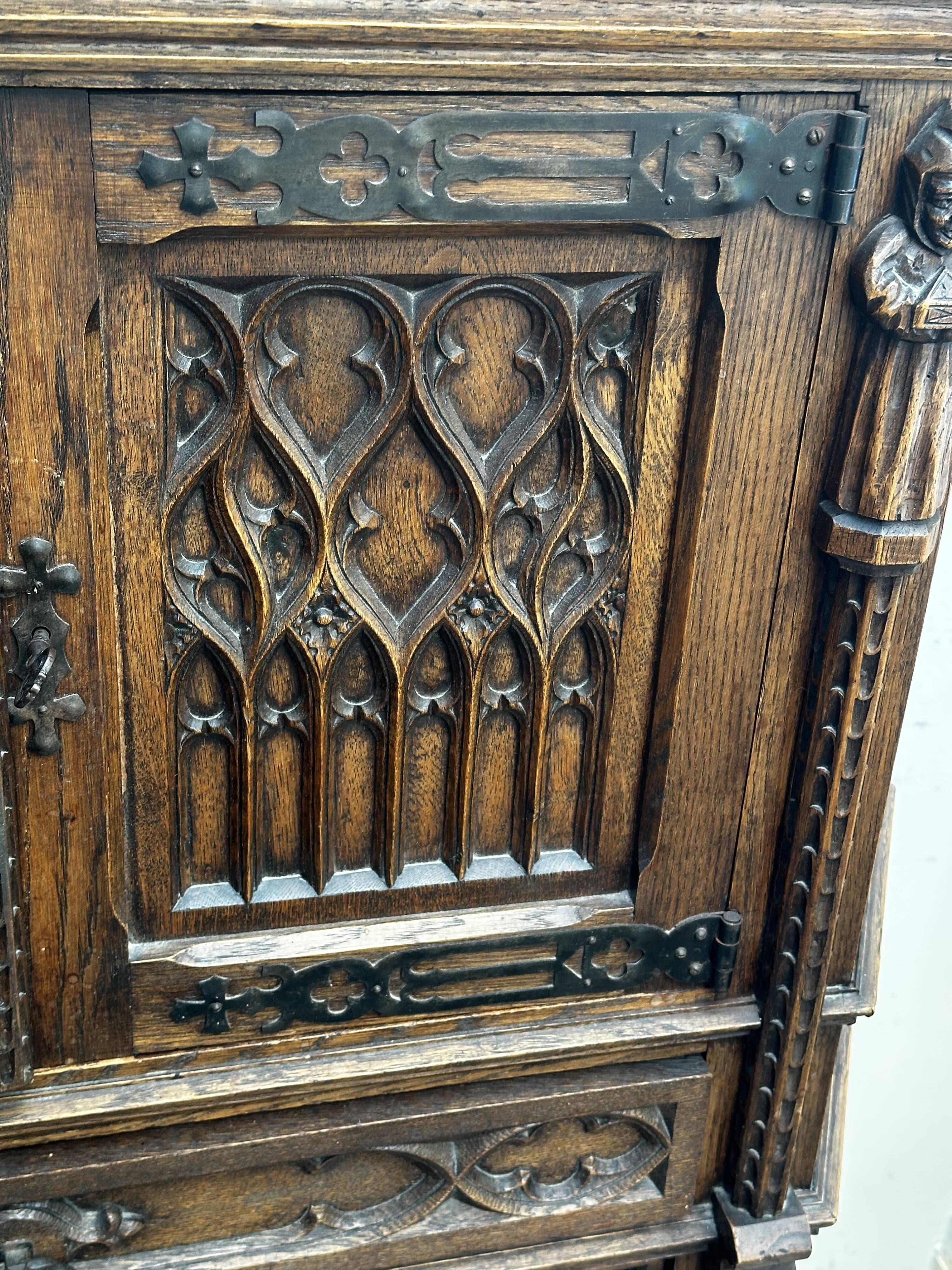 Pair of Gothic style cabinets in dark oak from the 19th century.