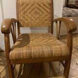 Two contemporary teak and rattan armchairs