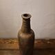 Brown stoneware bottle