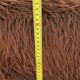 Vintage shaggy chair in faux fur with golden metal legs.