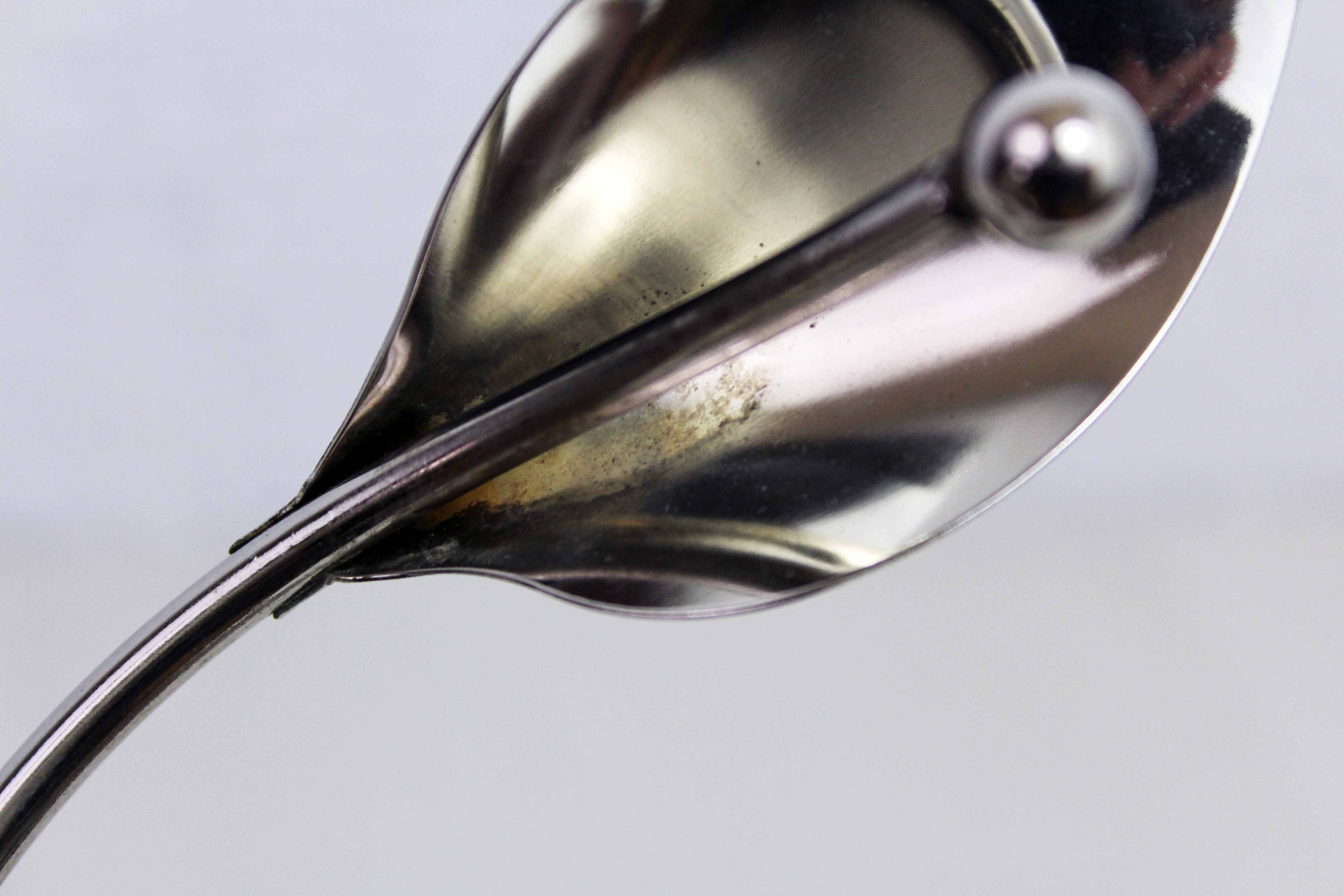 Chrome metal floral candle holder