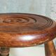 Low tripod stool in vintage turned solid wood