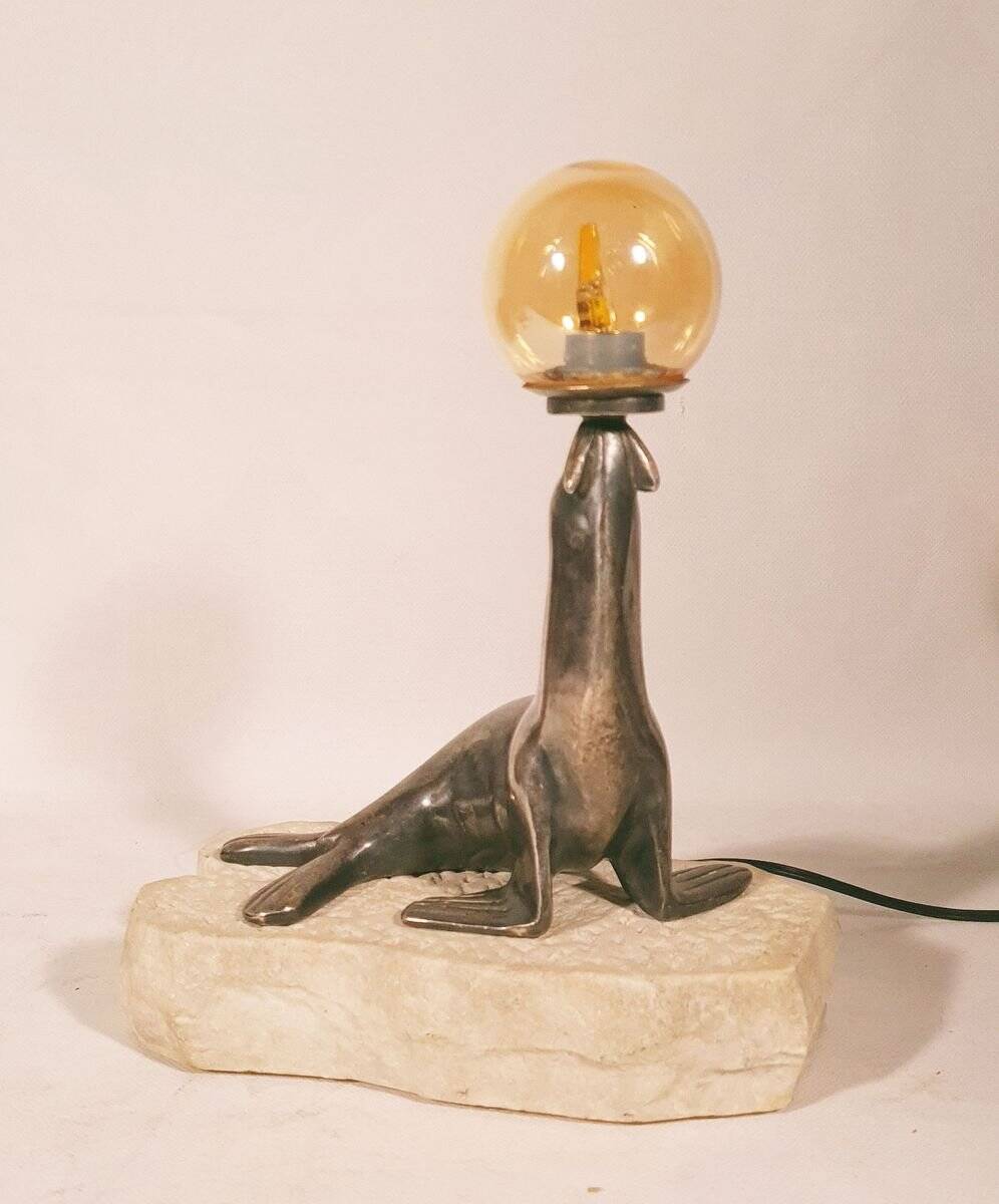 Art Deco "sea lion" lamp in silver-plated bronze