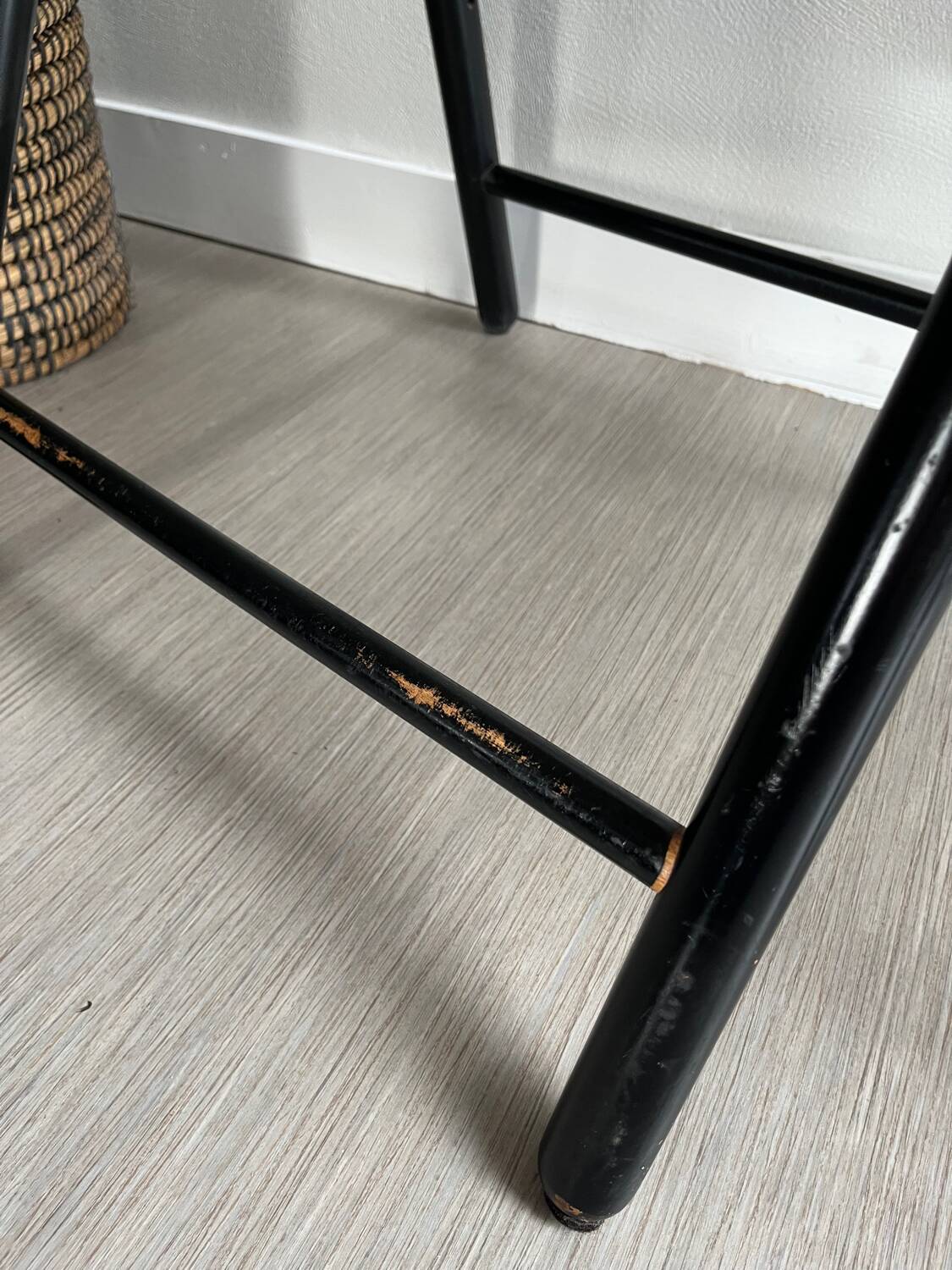 Vintage folding chairs in black wood and cane.