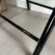 Vintage folding chairs in black wood and cane.