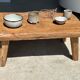 Coffee table in blond teak quadripod