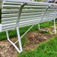Antique garden bench with metal legs