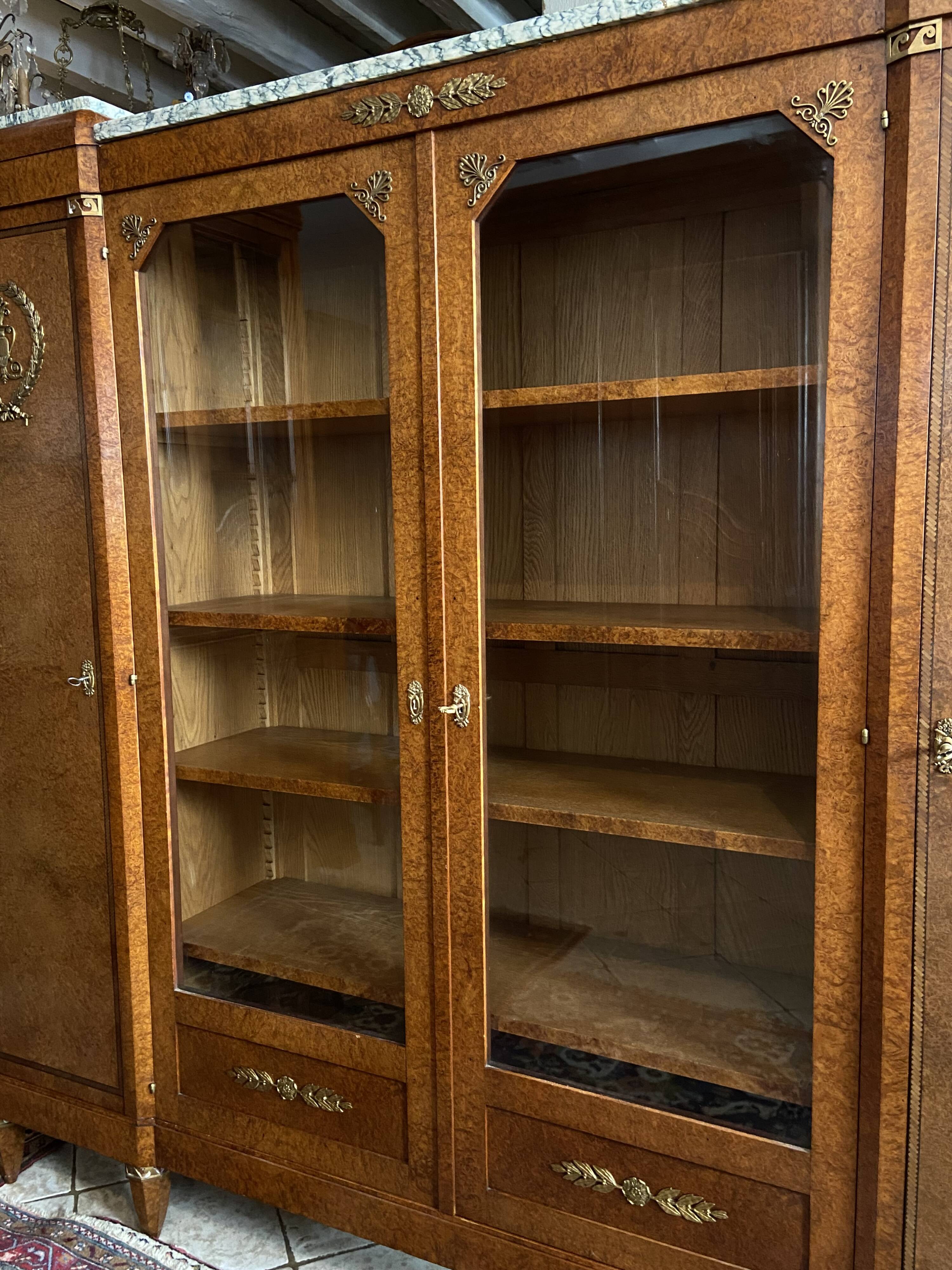 Showcase library in Neoclassical style, 1930, walnut burl and bronze.