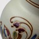 Vintage ceramic vase with bird decoration, signed.