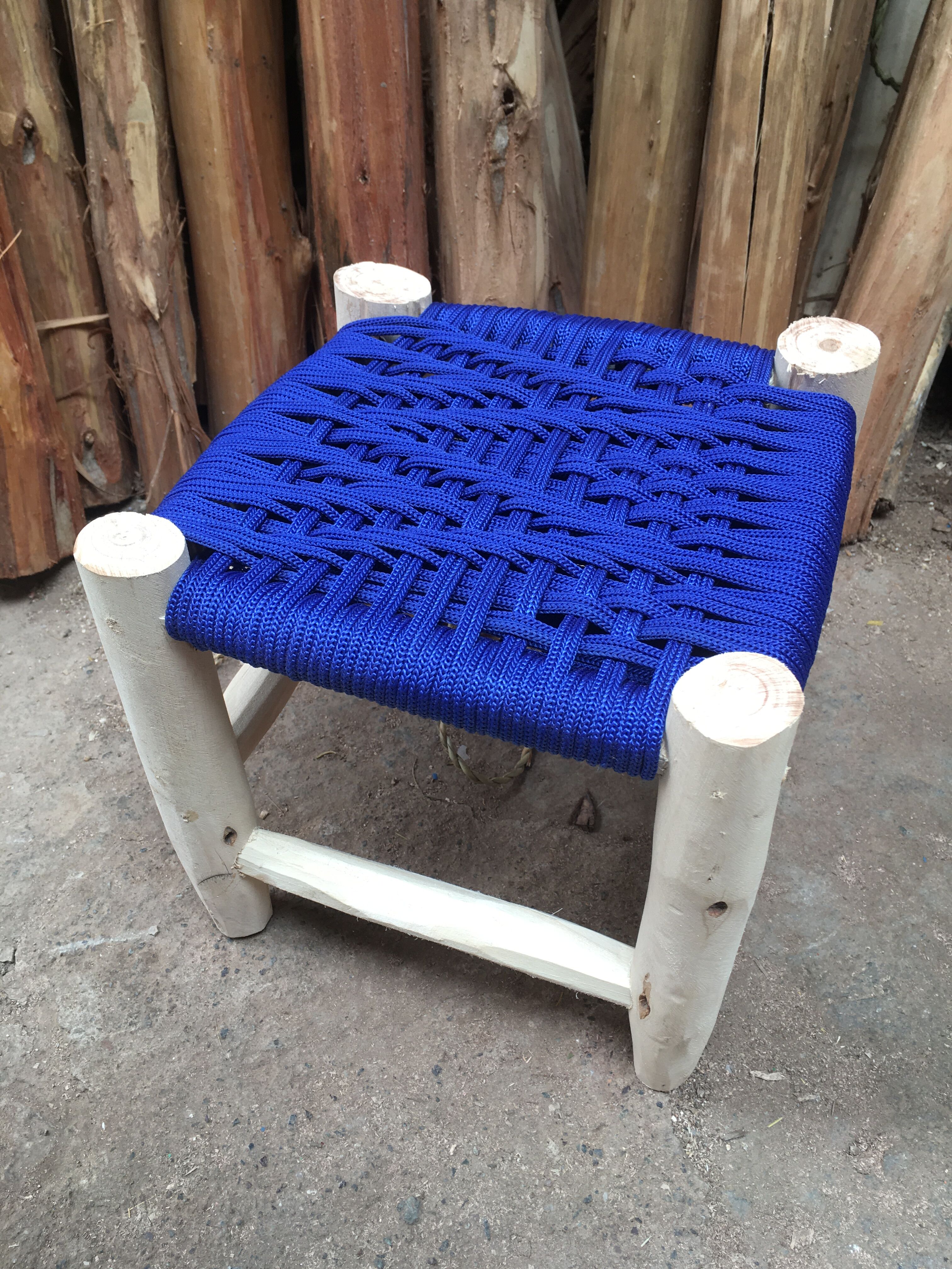 Traditional moroccan stool in blue nylon thread majorelle and eucalyptus wood