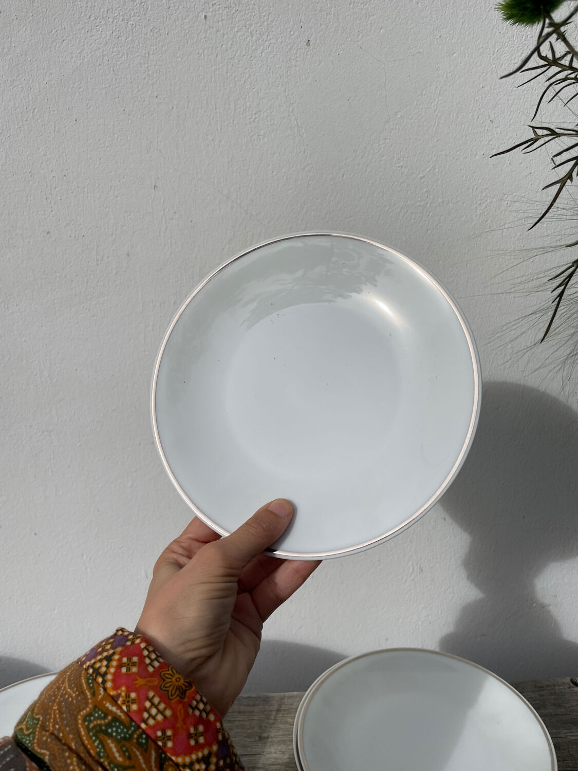 10 assiettes à dessert en porcelaine de Limoges blanches