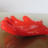 Empty hand-shaped pocket in red ceramic 80s