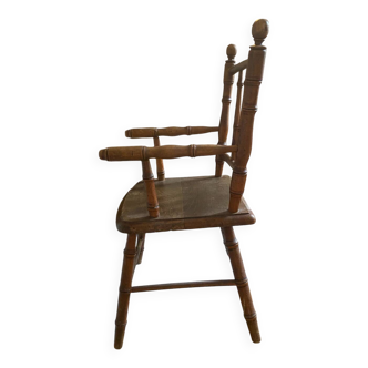 Children's chair Old children's chair in brown wood from the end of the 19th century