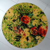 Round coffee table above resin flower decoration