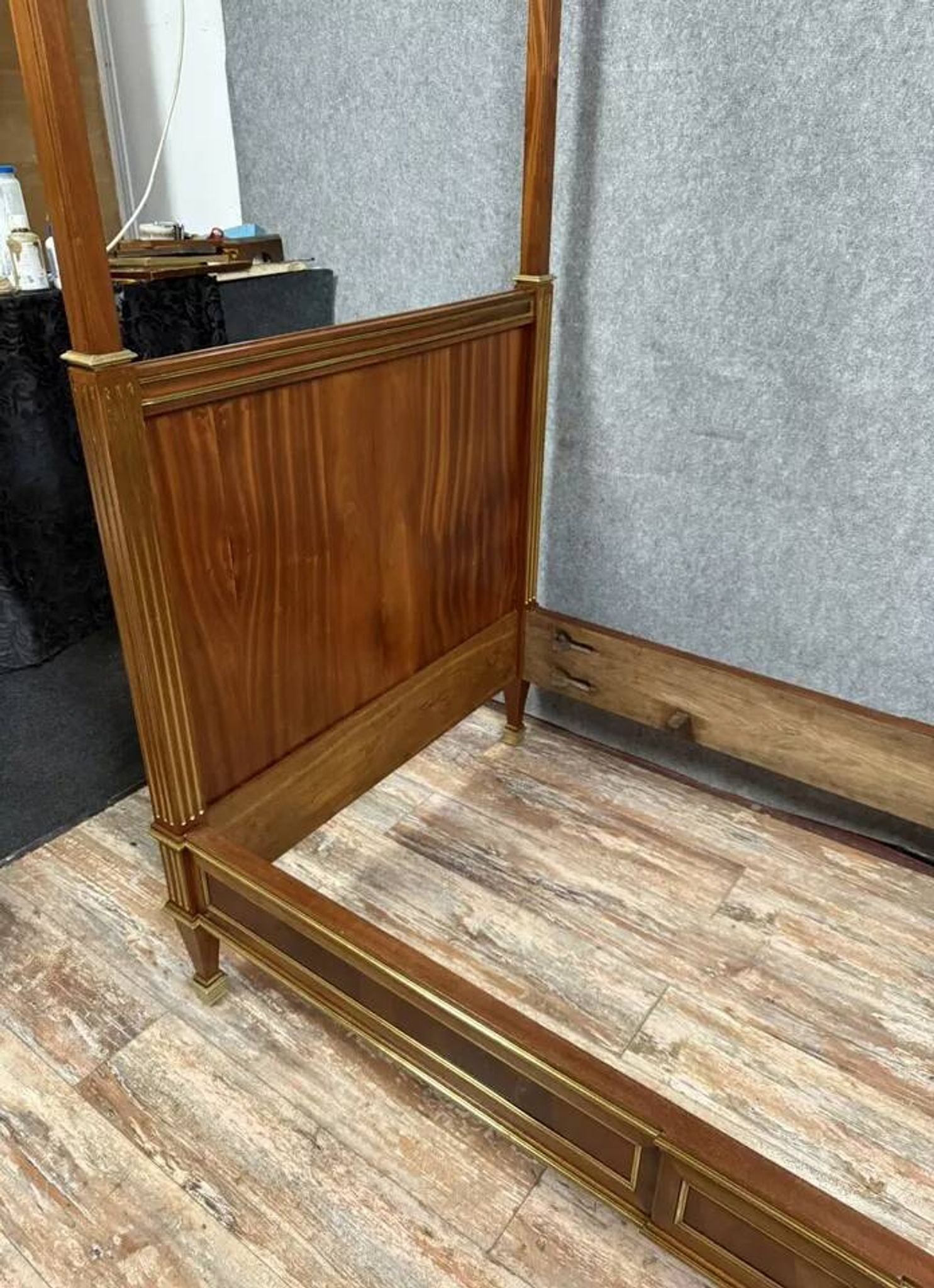 Parisian Louis XVI style four-poster bed in mahogany and gilded bronze circa 1850