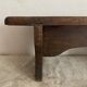 Old low stool made of solid wood