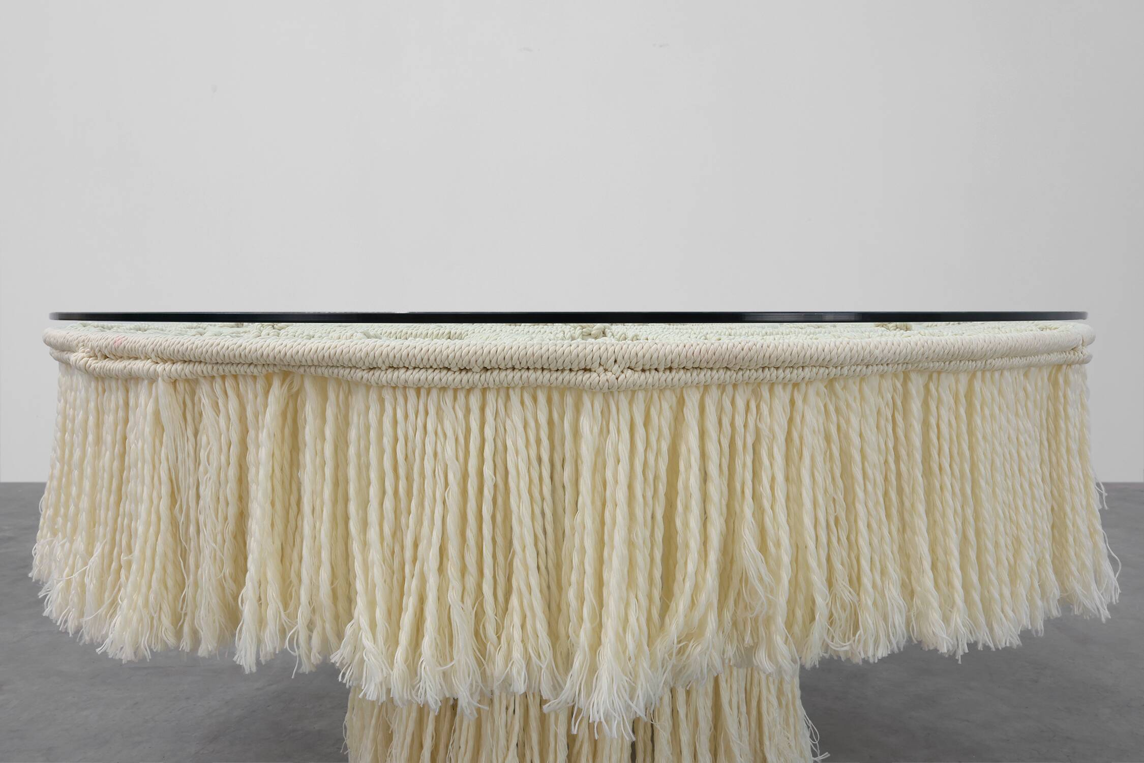 Monumental dining table with glass top and macramé, Italy