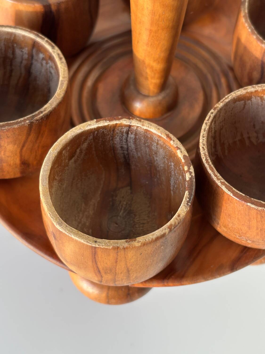 Wooden egg cups on a stand