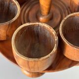 Wooden egg cups on a stand