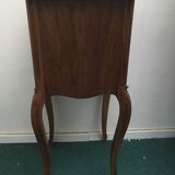 Louis Philippe beside table