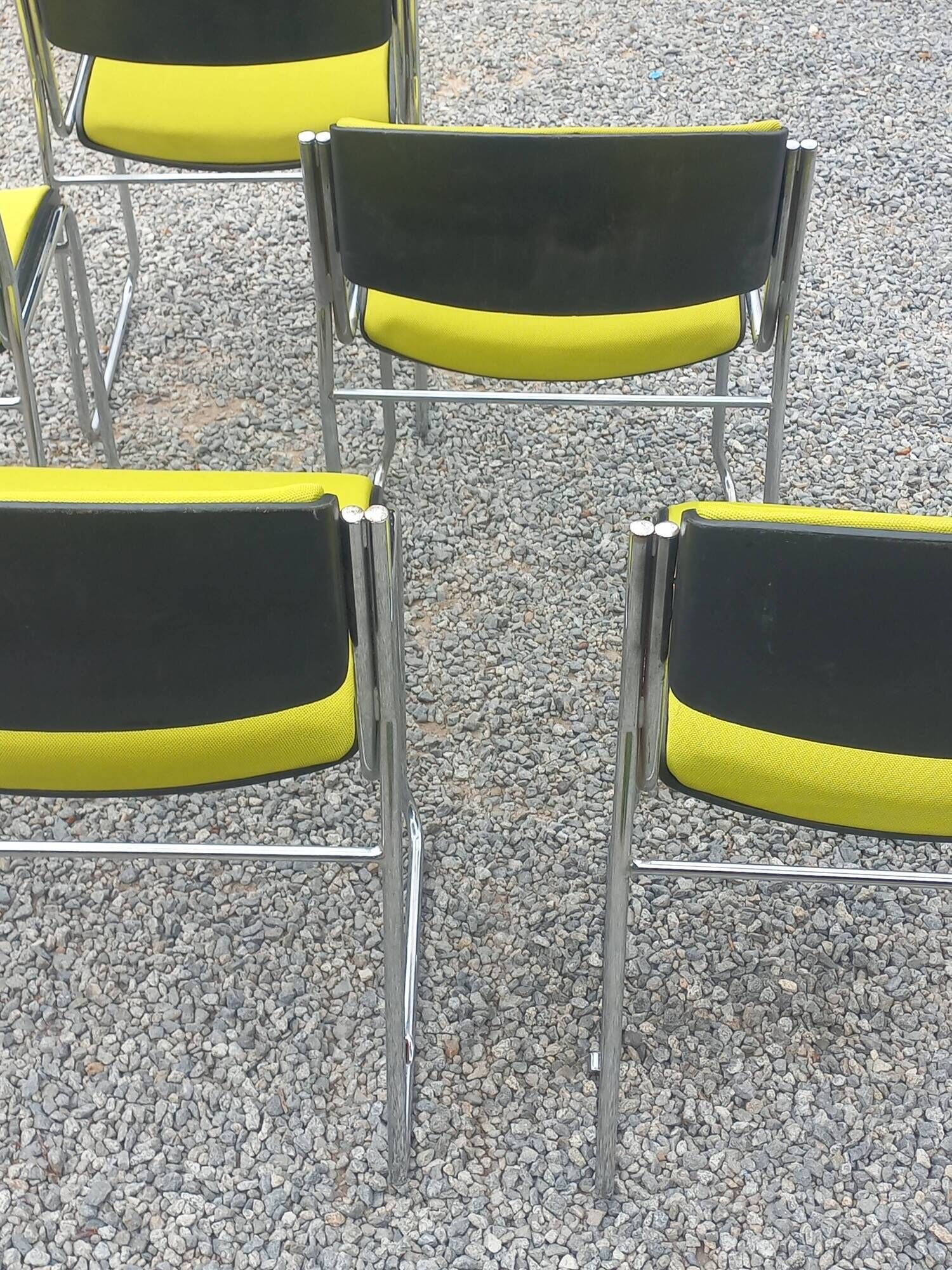 Set of 6 designer chairs with wooden seats and backs, chrome legs.