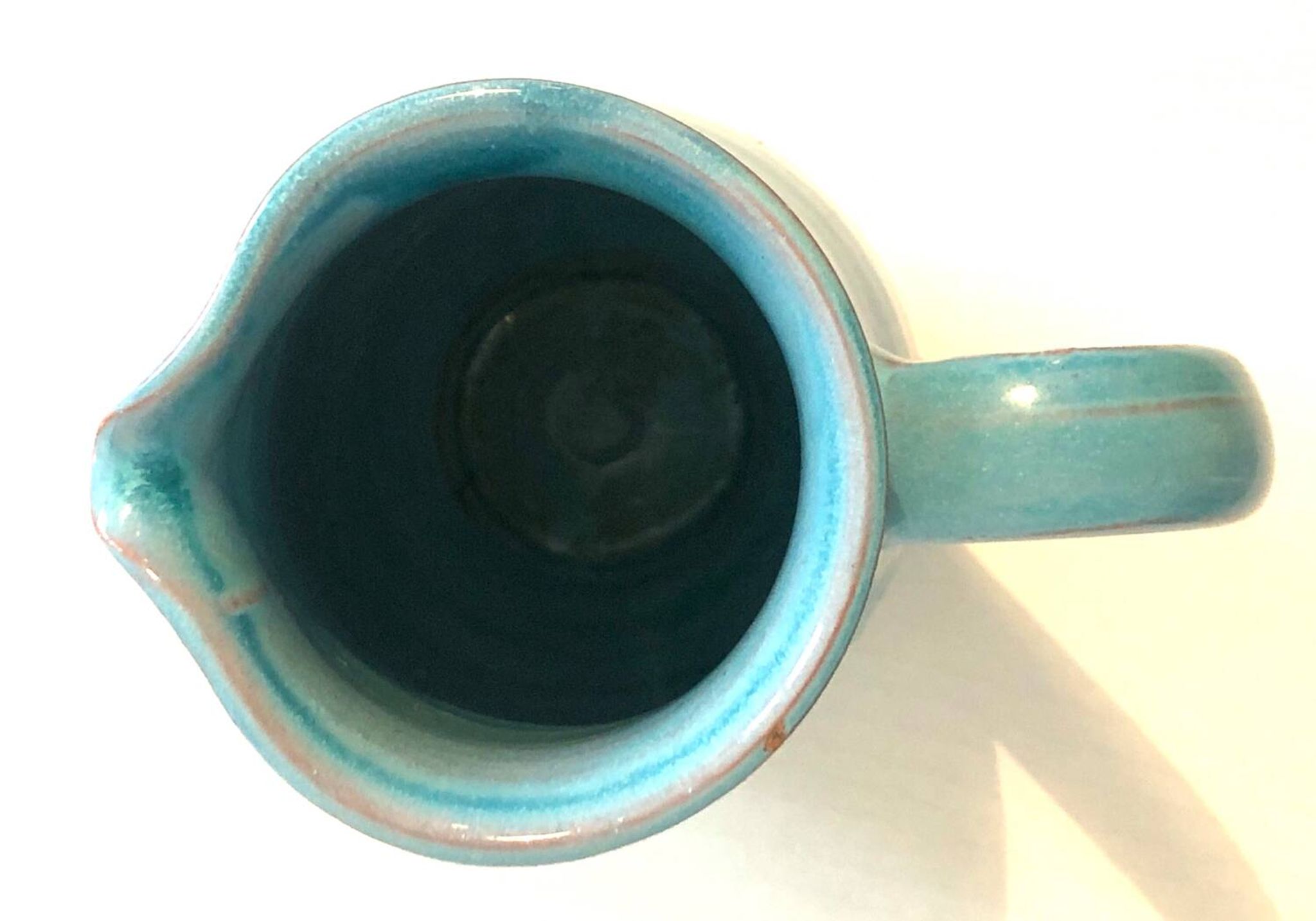 Blue ceramic pitcher