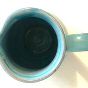Blue ceramic pitcher