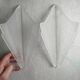 Pair of Art Deco wall sconces in frosted pressed glass.