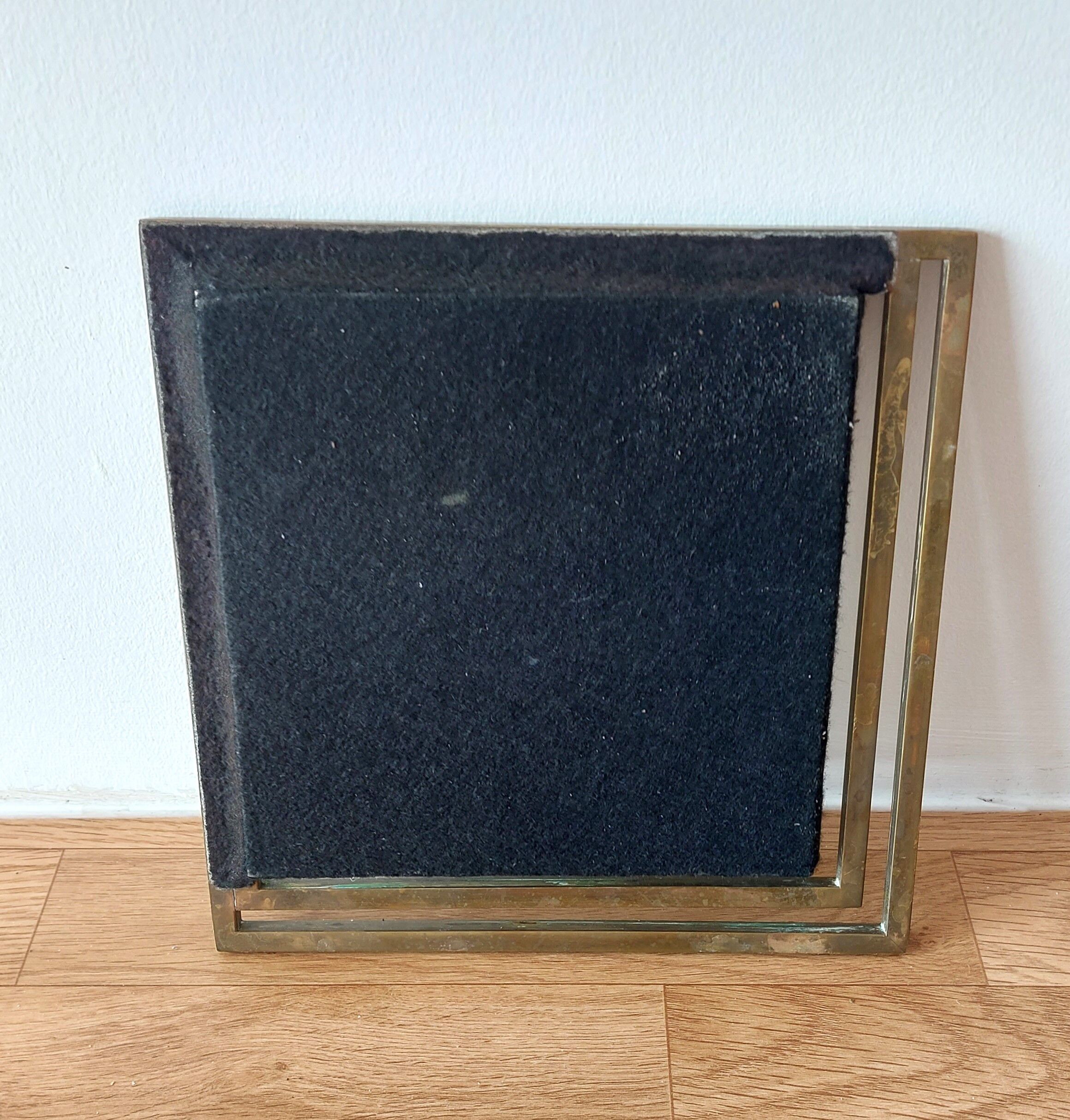 Modernist mirror in gilded brass 1960.