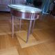 Hot water bottle pedestal table