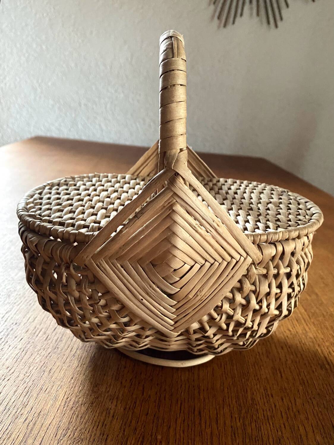 Handcrafted egg basket made of woven rattan and wicker