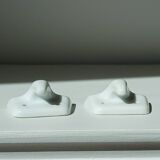 Set of two porcelain tea towel holders