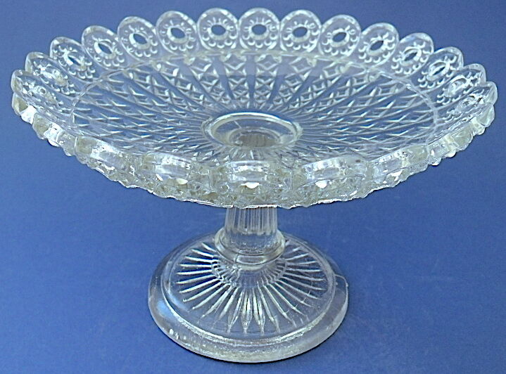 Plate mounted on pressed-molded glass column