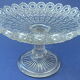 Plate mounted on pressed-molded glass column